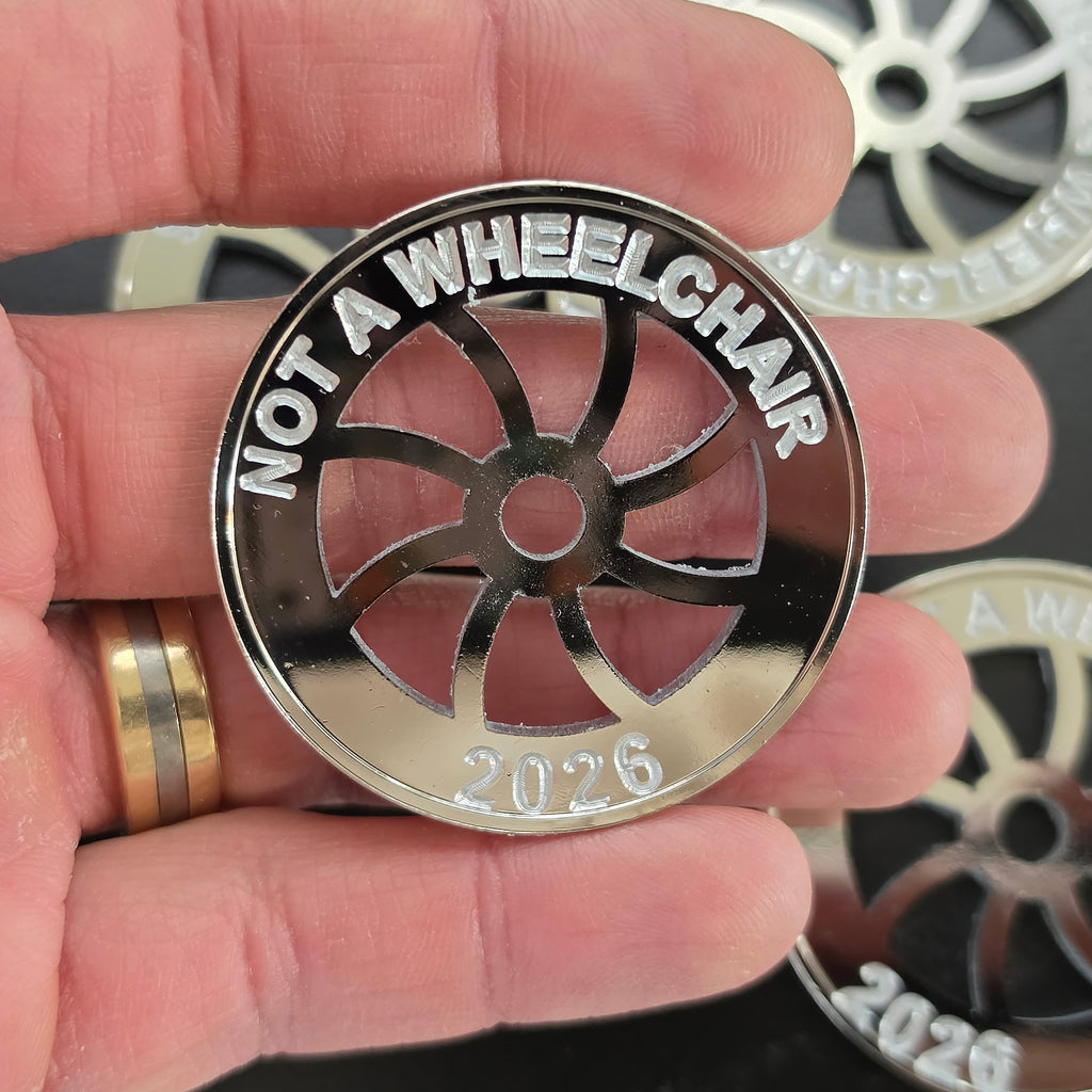Donate $15: One SILVER Collector's Coin Tire